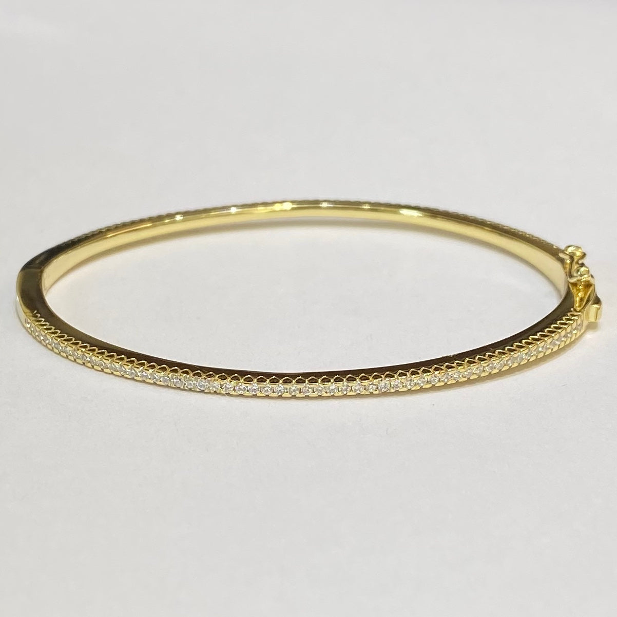 SINGLE CZ ROW OVAL BANGLE